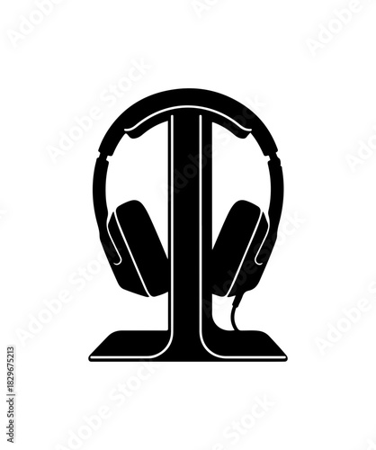 Sleek black headphones resting on elegant stand, audio tech for music lovers