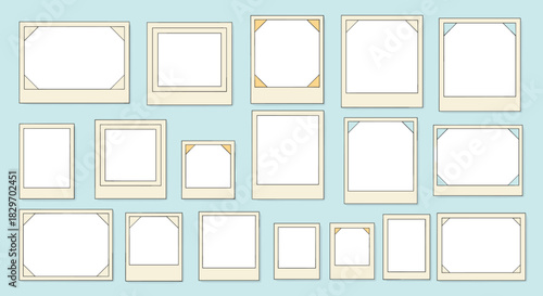 An assortment of blank instant photo frames and picture holders on a light blue background, ready for your memories.