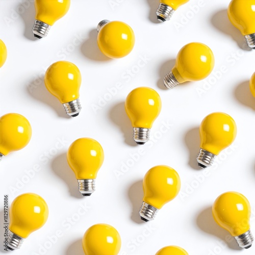 A cluster of vibrant yellow light bulbs arranged artistically against a clean white background, casting a warm glow and creating a cheerful ambiance.