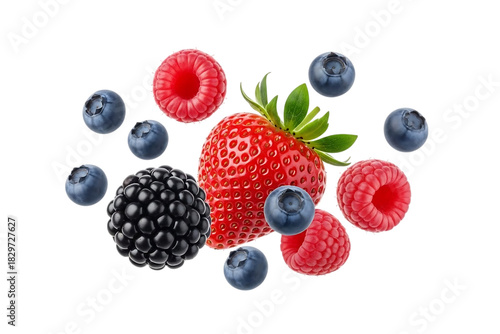 Fresh and colorful mix of berries floating in a black background