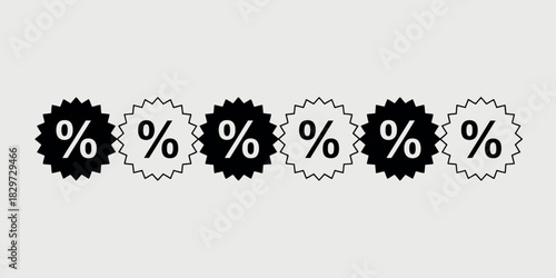 Row of black and white starburst percentage discount sale tags