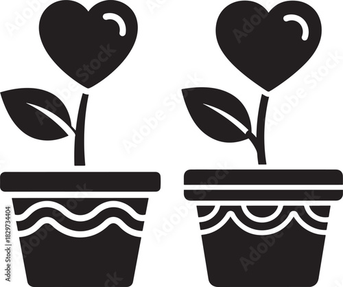 Two heart shaped plants growing in decorative pots silhouette