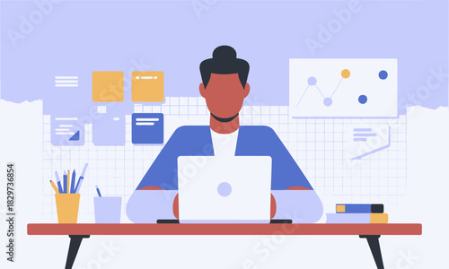 Faceless person working on a laptop at a desk with office supplies