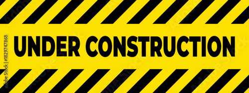 Under Construction Warning Sign with Yellow and Black Stripes.