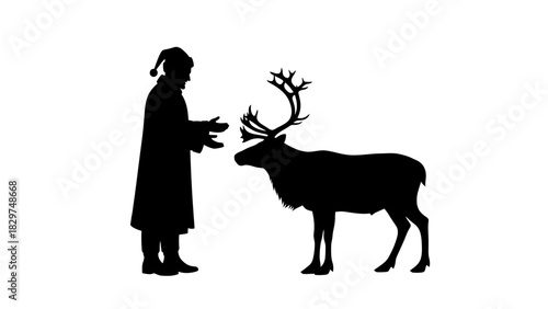 A black silhouette of a person in a winter coat and hat standing next to a reindeer with large antlers.