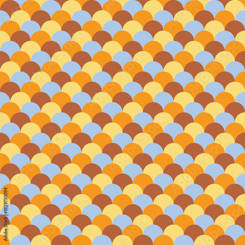 Pattern created from rows of overlapping brown, gold, pale blue and yellow circles