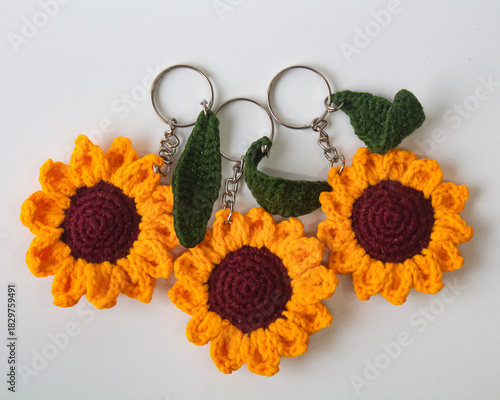 Принти на полотні Multiple Carefully Crafted Crochet Sunflower Keychains Captured in a Neat Arrang