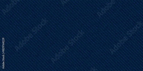 Navy blue cotton fabric pattern close up as background. Denim blue grunge textured seamless pattern. Dark navy blue denim jeans.
