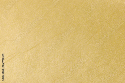 上品な光沢を持つ黄金色の和紙の背景素材　Washi Paper Background Texture with Golden Shine Japanese Style Luxury