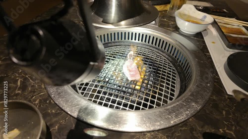 The process of grilling Japanese Wagyu beef.