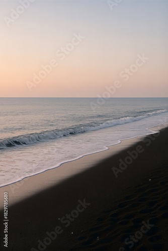 Soft shore on black sand evening