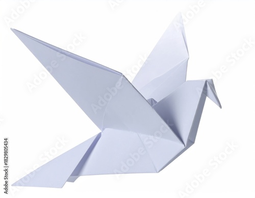 White paper origami dove soaring gracefully