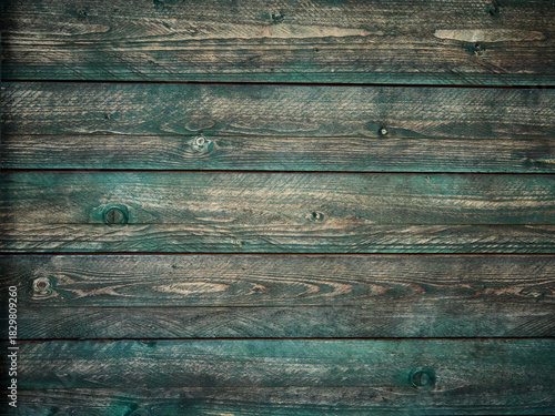 Wood texture background of several planks, muted tones, natural subtle colors, soft rustic feel, minimal artistic composition, warm and cozy surface detail, natural wood pattern.