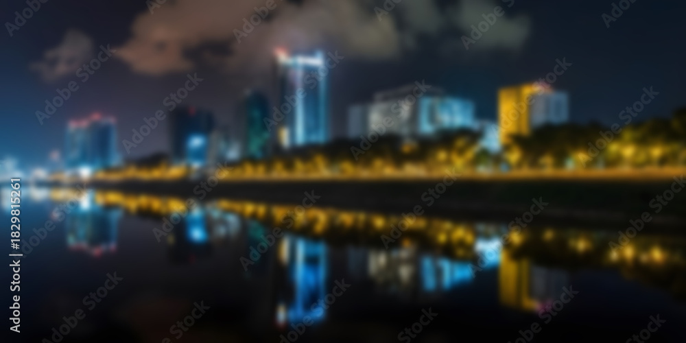 Fototapeta premium Nighttime Cityscape with Reflections and Illuminated Skyscrapers Blur photo Concept