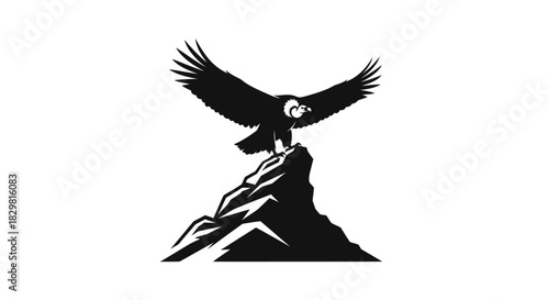 Majestic Condor Perched on Mountain Peak with Wings Spread.