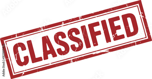 Authentic looking red classified grunge stamp angled on a white surface for official documents