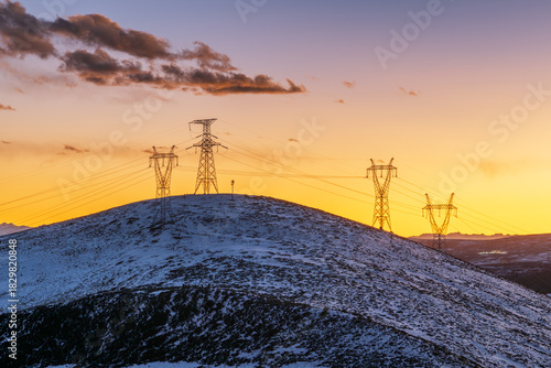 The Power Grid on the Snowy Plateau at dusk