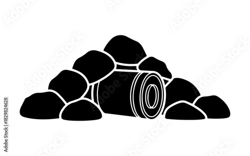 Silhouette of a rolled sleeping bag surrounded by rocks, ready for a camping adventure.