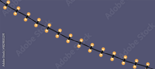 Diagonal string of glowing warm yellow light bulbs on a dark purple background
