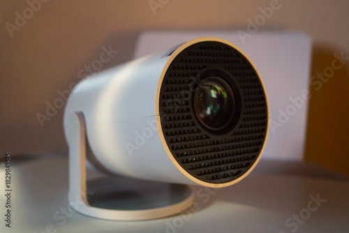 small white projector for showing videos