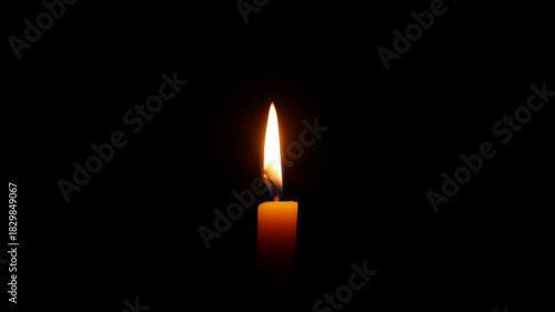 A lone flame wavers in spacious shadow where subtle shifts of light express heartfelt loss enduring sadness and the fragile persistence of inner reflection. Mourning grief.