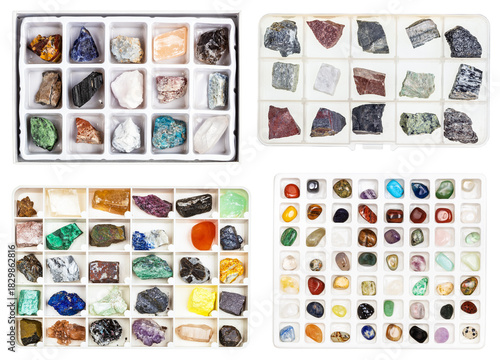set of various boxes of natural minerals isolated