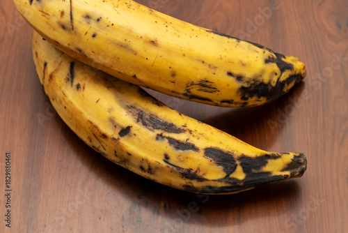 Ripe Kerala Nendran Bananas on Wooden Background