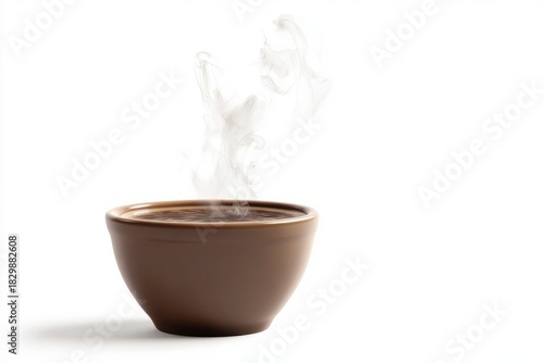 Cup of coffee with steam rising in a cozy setting on a wooden table with natural light