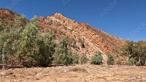 Red Rock Cliffs and Sedimentary Layers Along Brachina Gorge Geological Trail in Flinders Ranges National Park, South Australia