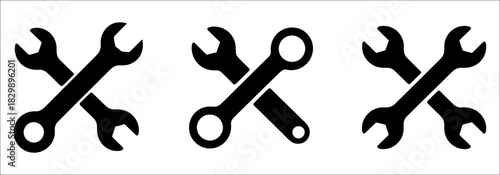 Tools of the trade with crossed wrenches hinting at repair services, construction, engineering, and automotive work for your next project.