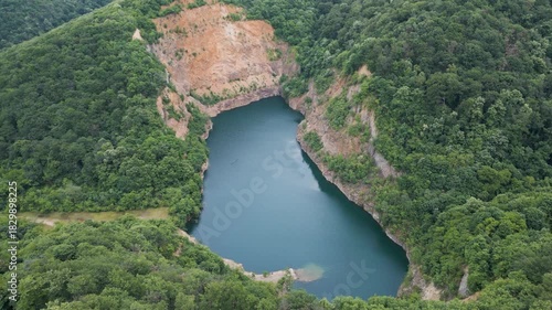 Drone aerial view of lake with mountains