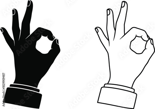 Two hands making the ok sign one in black and one in white