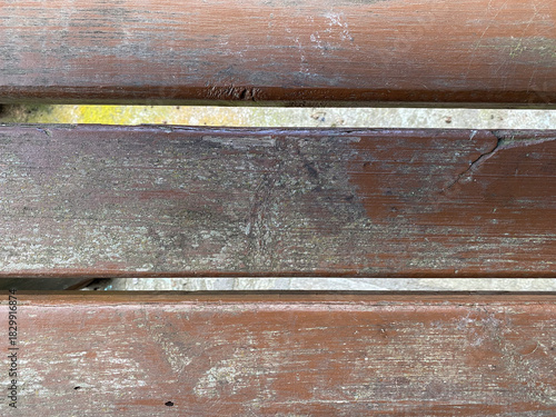 Close-up of weathered wooden bench planks for rustic outdoor design