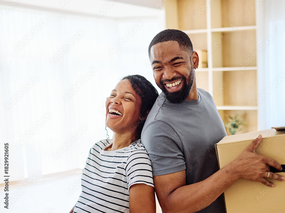 Fototapeta premium Young black couple moving into a new modern house, carrying boxes and arriving home together. Happy, excited and smiling husband and wife walking, entering and relocating after buying an apartment