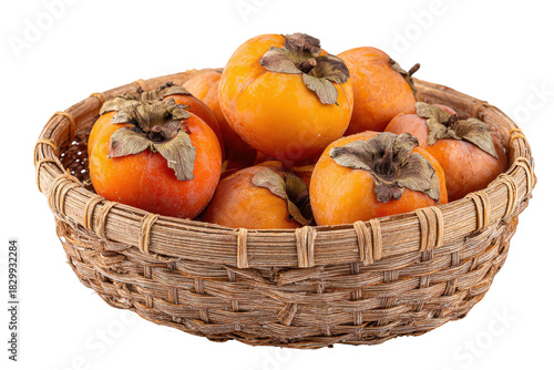 Wallpaper Mural Woven basket filled with ripe persimmons isolated on transparent background. Ripe persimmons in woven basket fresh autumn fruit harvest isolated on white background. Torontodigital.ca