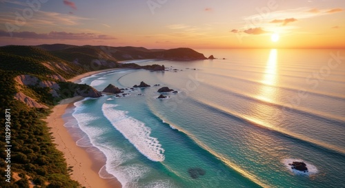Aerial View of a Serene Beach at Sunset with Gentle Waves.