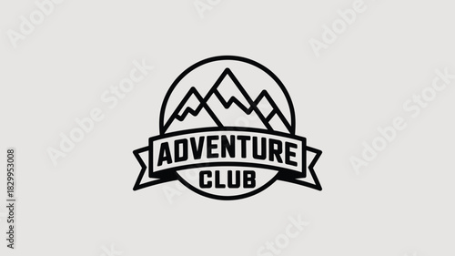 A black and white adventure club logo featuring mountains inside a circle and banner with text below it