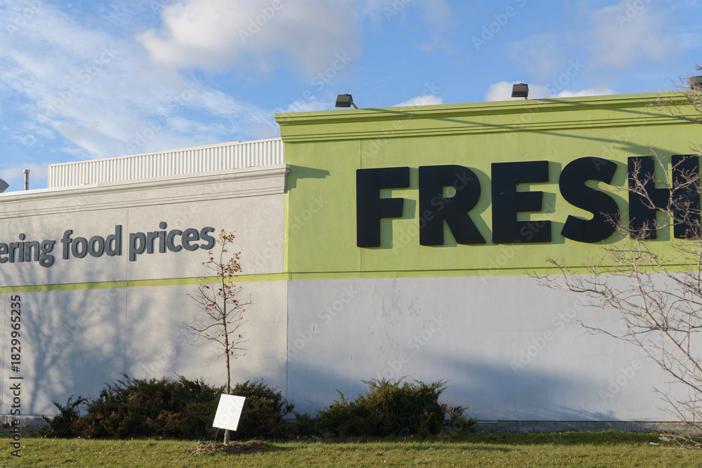 Fototapeta premium exterior sign of FreshCo (a supermarket chain) Leslie & Lakeshore, located at 731 Eastern Av, Toronto