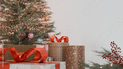 Christmas Tree with Gifts and Holiday Decorations on White Background