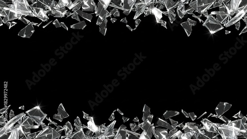 Dramatic composition of shattered glass fragments forming a border against a stark black background.