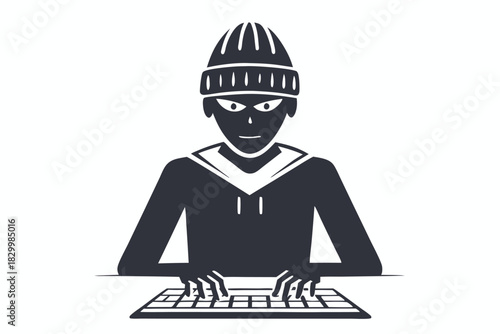 Unhappy person wearing a beanie works on a dark laptop computer with determination