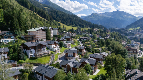 Wallpaper Mural Scenic aerial view of a charming alpine village nestled in a mountain valley Torontodigital.ca