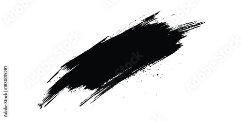 Textured black paint brush stroke with grunge effect on a white background