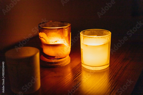 The lights and electricity in the apartment are turned off. Candles are burning brightly.