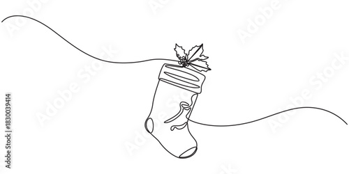 Christmas stocking in one continuous line on a white background. Christmas and New Year vector illustration. Christmas concept. Minimalistic style. Continuous one line drawing of Christmas socks.