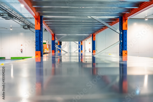 Stainless steel industrial shelving rack for refrigerated fruit and vegetable storage.
