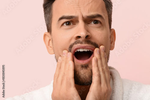 Handsome man with toothache...