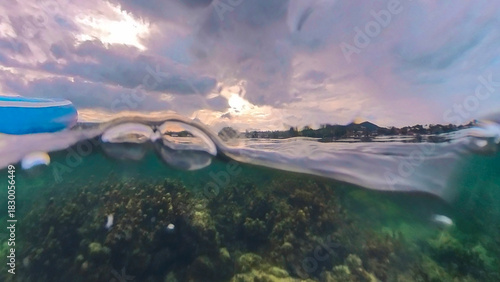 Stormy cloudscape seascape water edge on the shore of an ocean in a tropical Thailand beach