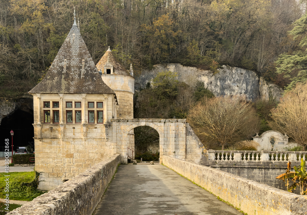 Fototapeta premium Buildings small vineyard on the Dronne River, Brantome, Brantome-en-Perigord, France