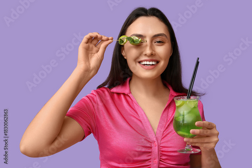 Happy young woman with glas...
